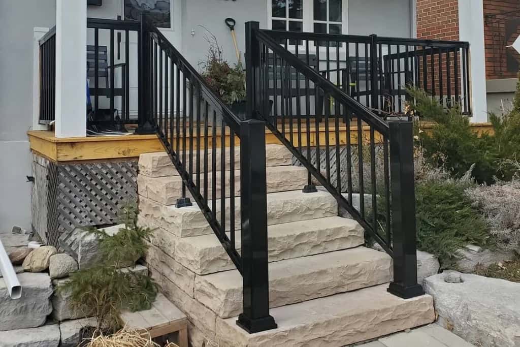 Black aluminum picket porch railing on the Danforth, Toronto