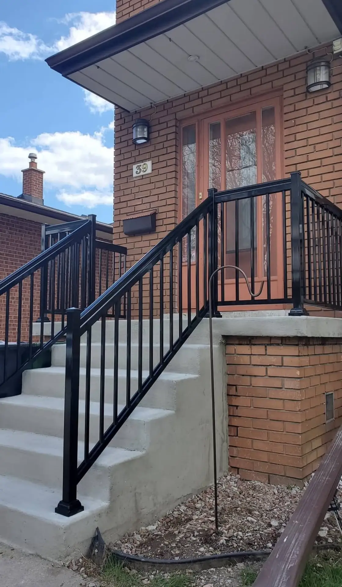 Angled exterior stair railing