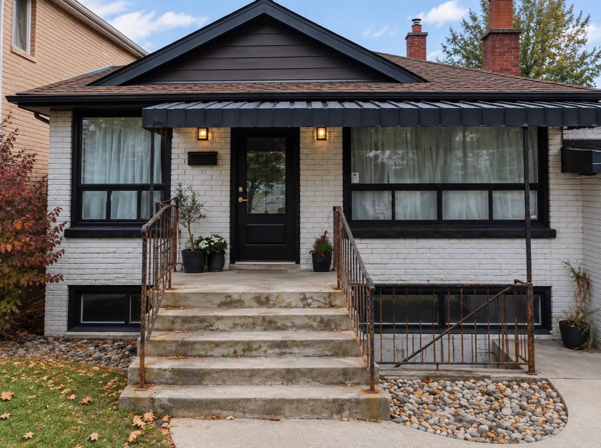 North York front steps with worn metal railings before the update
