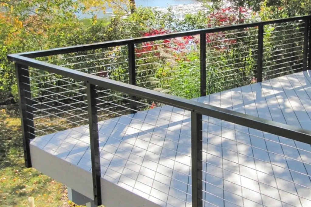 Cable railing with black aluminum posts on deck balcony