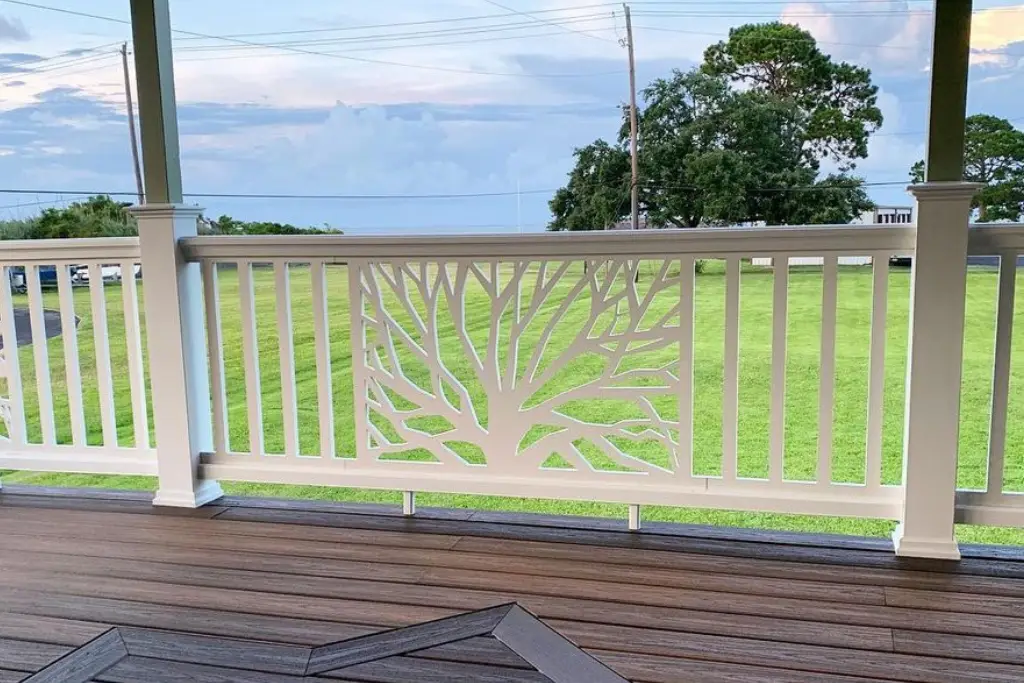 Custom white composite deck railing with decorative design installed at a home in Etobicoke, Toronto.